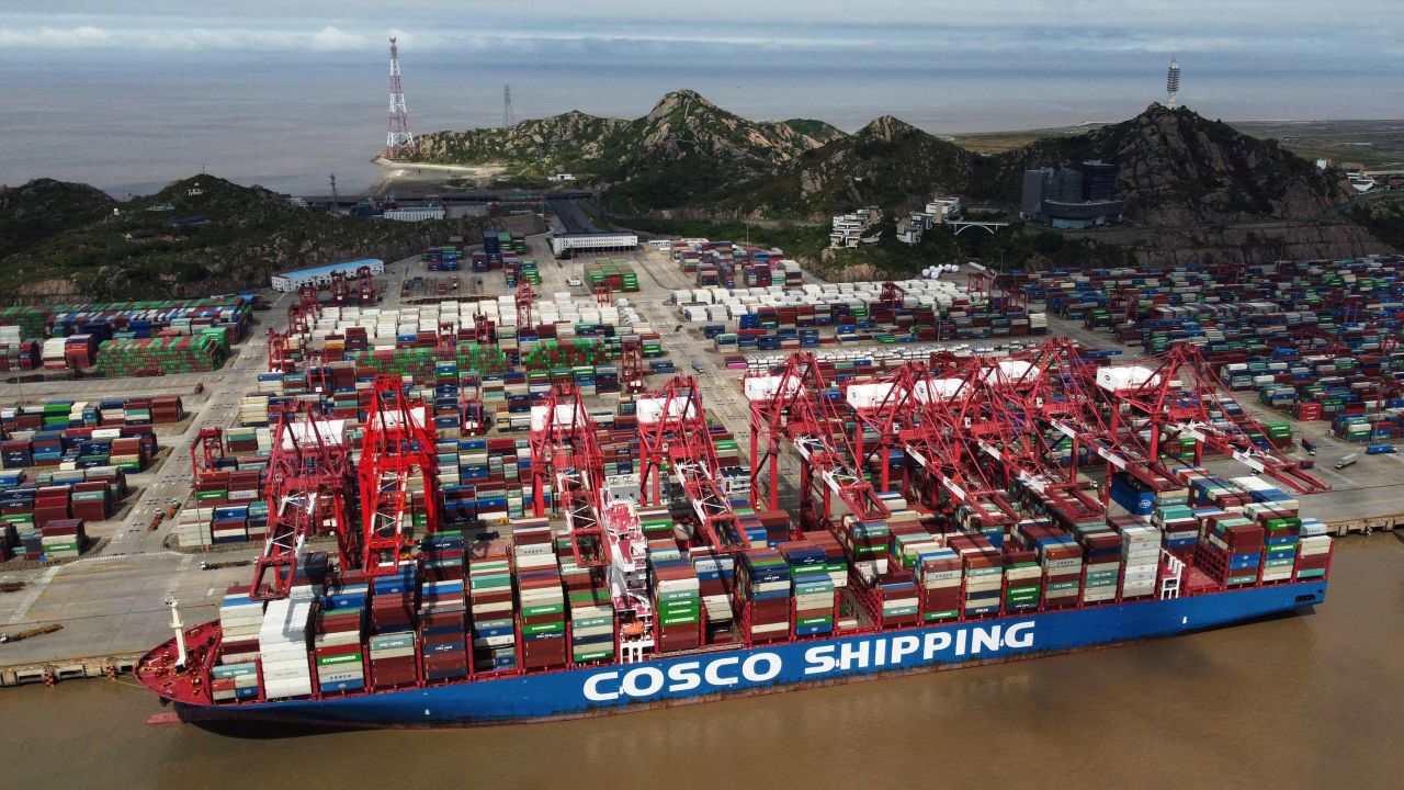 FILE PHOTO: A Cosco Shipping container ship is seen at the Yangshan Deep Water Port amid the coronavirus disease (COVID-19) outbreak in Shanghai, China April 24, 2022. Picture taken April 24, 2022. cnsphoto via REUTERS   ATTENTION EDITORS - THIS IMAGE WAS PROVIDED BY A THIRD PARTY. CHINA OUT./File Photo